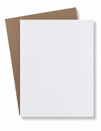 Overlapping chipboard sheets showing the white front and kraft back